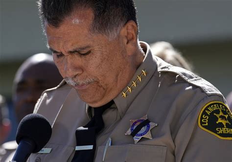 The Los Angeles County sheriff says a suspect has been arrested in the ambush killing of a deputy